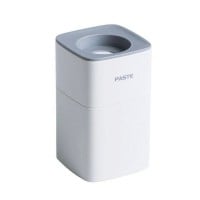 Dispensador Pasta de Dientes de pared blanco