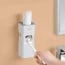 Dispensador Pasta de Dientes de pared blanco